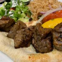 Lamb and Beef Combo · 1 skewer of lamb and beef combination, served with fresh salad, rice, grill Vegetables and a...