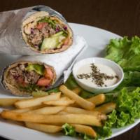Kofta Wrap/fries/soda · Mildly seasoned ground beef and served with chopped salad wrapped in fresh house baked naan....