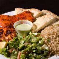 Grilled Salmon · Sustainable 2 pieces of Atlantic salmon, marinated in Afghan spices and herbs. Served with t...