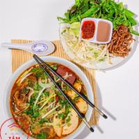 18. Hue Style Beef Noodle · Bun bo hue. Vemicelli with spicy soup, shark beef, tender beef, special flavor, lecture and ...