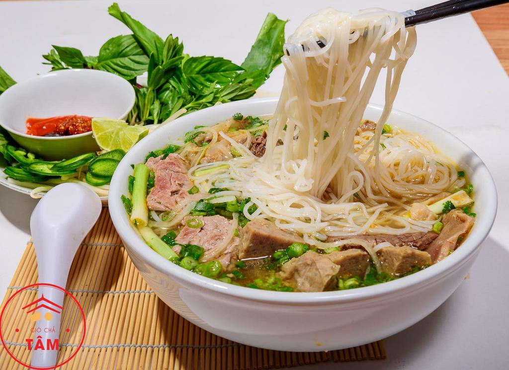 21. Special Beef Noodle Soup · Pho dac biet. Beef noodle soup with eye round beef, brisket, tripe, tendon, meat ball, onion and basil.