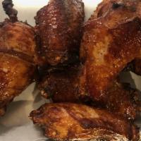 Chicken Wings · 6 pieces. Choice of Naked, Dry-Rub Creole, Thai Peanut,  Korean Barbecue, Mandarin Orange Ch...