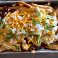 Chili Cheese Fries · French Fries, House-Made Three Meat Chili (Bacon, Beef, Pulled Pork), House Queso Sauce, Che...