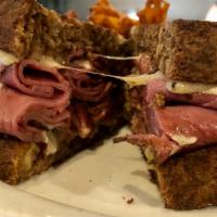 ABV Pastrami Sandwich · Sliced Pastrami, Gruyere Cheese, Mama Lil’s Peppers, Dijonnaise Sauce on Rye Bread.   Pickle...