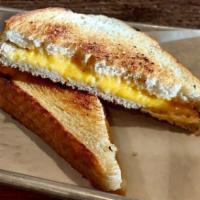 Grilled Cheese Sandwich (vegetarian) · Grilled Cheddar Cheese on Bread
