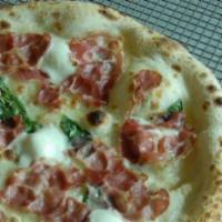 Bufala and Coppa Pizza · Imported mozzarella di Bufala with basil and capicola. We recommend adding only one addition...