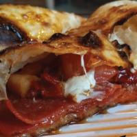 The Ultimate Calzone · Mozzarella, pepperoni, fresh and sun-dried tomatoes and rosemary. 