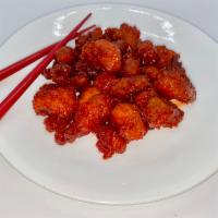 Sweet & Sour Chicken · An American-Chinese staple. Wok-fried chicken tossed in a sweet & sour glaze.
