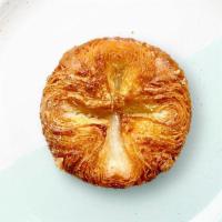 Kouign Amann · The Kouign Amann is part sticky bun & part croissant. Flaky buttery pastry baked with layers...