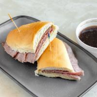 French Dip ＆ Swiss · Thinly Sliced Beef, Aged Swiss Cheese, Toasted French Roll, Served with Au jus.