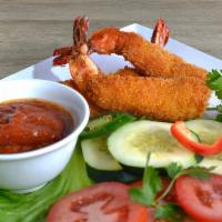 Tom Khai Vi · Tay ho's shrimp special, served with sweet and sour sauce and vegetables. 