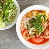 Bun Rieu Oc · Vermicelli noodles soup with shrimp egg and sea snail.