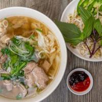 Pho Bo · Beef rice noodles soup with rare sliced beef, well- done flank, tendon and beef balls.