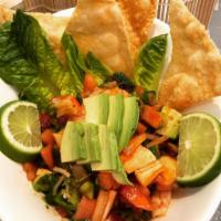 Ceviche · Shrimp, crab, octopus, white tuna, cucumber, pico de gallo, and cilantro served with fried w...