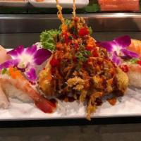 Nigiri Dinner · 6 pieces of nigiri (chef's choice). California roll, squid, and seaweed salad.