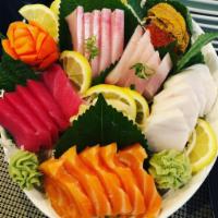 Sashimi Dinner · 15 pieces of sashimi (tuna, salmon, yellowtail, white tuna, and octopus) with squid and seaw...