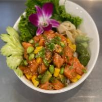 Kin Poke Bowl · Choice of tuna or salmon marinated in spicy poke sauce topped with green onion, salmon roe (...