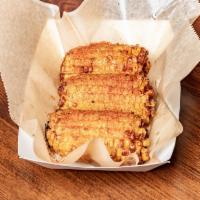 Fried Corn · Fried corn on the cob topped with our house Cajun spices. Finally, a corn that won’t stick t...