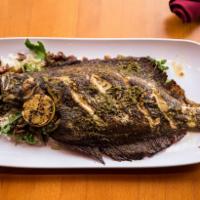 Whole Rockfish · Served with Basmati Rice.  Drizzled with a caper-olive oil and citrus flavoring