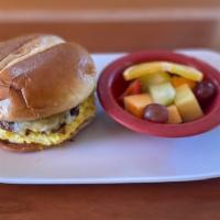 Breakfast Sandwich · Choice of egg, cheese and meat on a buttery Brioche bun, served with choice of side