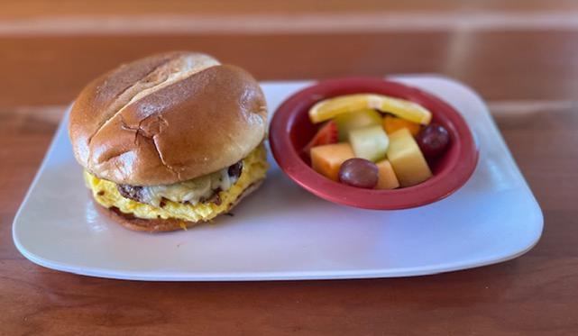 Breakfast Sandwich · Choice of egg, cheese and meat on a buttery Brioche bun, served with choice of side