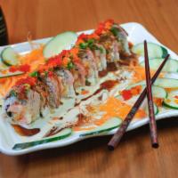 Erika #2 Roll · Shrimp tempura, mixed spicy crabmeat, topped with seared beef and special sauce.