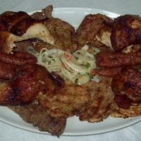 Family Meal 2 · 1/2 chicken, 1/2 lb. steak, 1/2 pork, 1 chicken boneless breast and sausage. Served with 2 l...