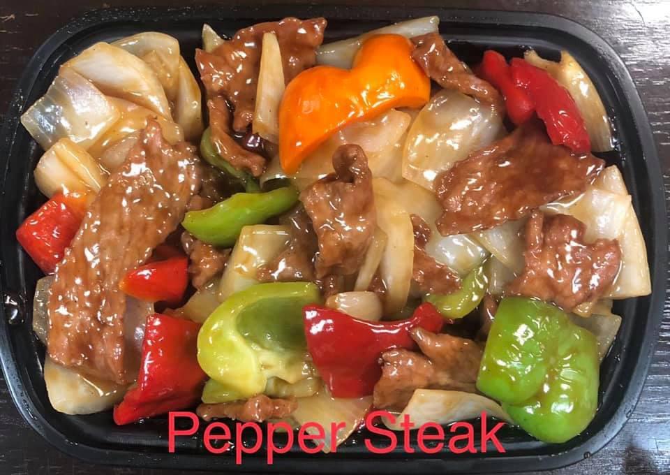 91. Pepper Steak with Onion · Stir fried steak with vegetables and a savory sauce.