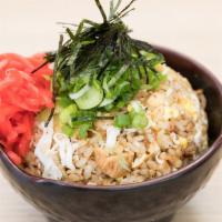 Fried Rice · Sauteed with egg, pork, imitation crab, chicken and topped with scallions, ginger and sesame...