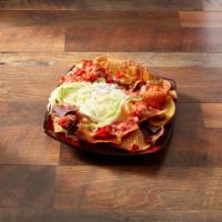 Compass Nachos · Fresh corn tortilla chips layered with cheddar Jack cheese, roasted red peppers, and sliced ...