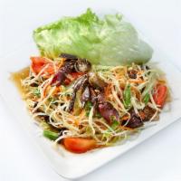 Papaya Salad · Papaya salad with peanut, dried shrimp, green bean, tomato in lime  sauce and dry shrimp