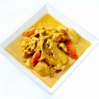YELLOW CURRY  · In coconut milk with potatoes,onions,and carrot