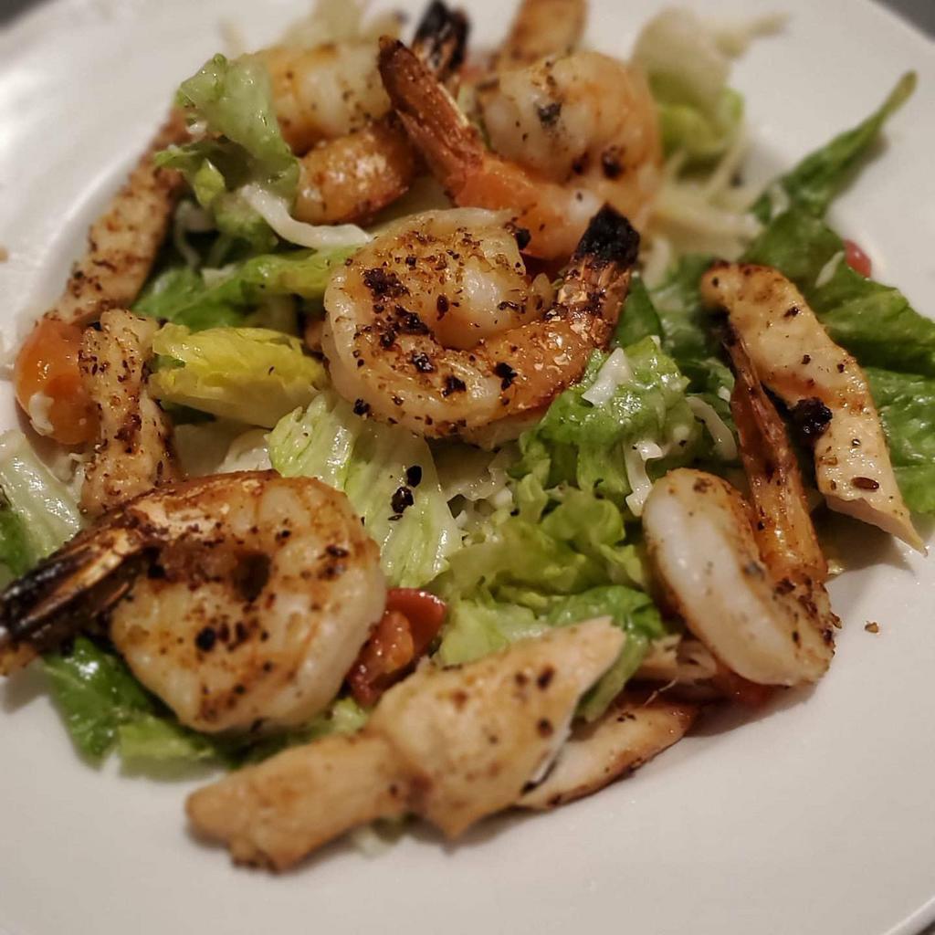 Caesar Salad · Add chicken or grilled shrimp for an additional charge.