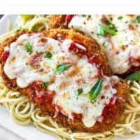 Chicken Parmigiana · Breaded boneless breast of chicken baked in tomato sauce topped with mozzarella cheese and s...
