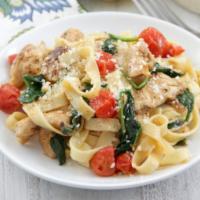 Chicken Florentine · Boneless breast of chicken dipped in egg batter,  sauteed in sherry wine, lemon and butter, ...