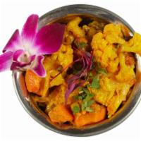 Mix Vegetable · Cauliflower, carrots, potatoes, green peas sauteed with Indian spices, onions and green chil...