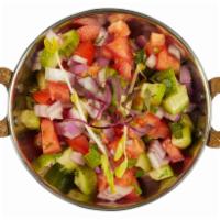 Kachumber · Chopped cucumber, red onions, tomatoes, cilantro and lime juice. Vegan, gluten free.