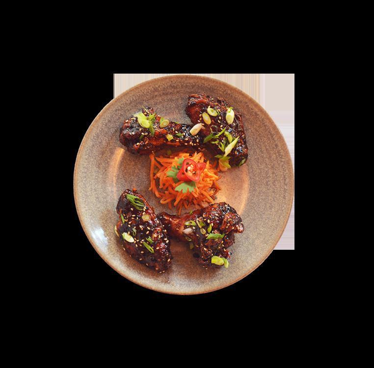 106. Korean Chicken Wings · fried chicken wings . sweet + spicy sauce. pickled carrot garnish. scallions. sesame seeds