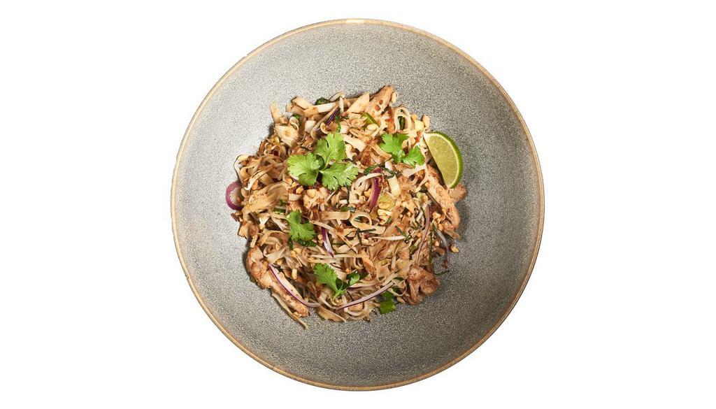 48. Chicken Pad Thai  · Rice noodles. chicken, egg, bean sprouts, leeks, chilies, and red onion. Garnished with fried shallots,shallots, fresh herbs, and lime