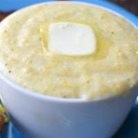 Cup of Southern Style Grits · Add cheese for an additional charge.