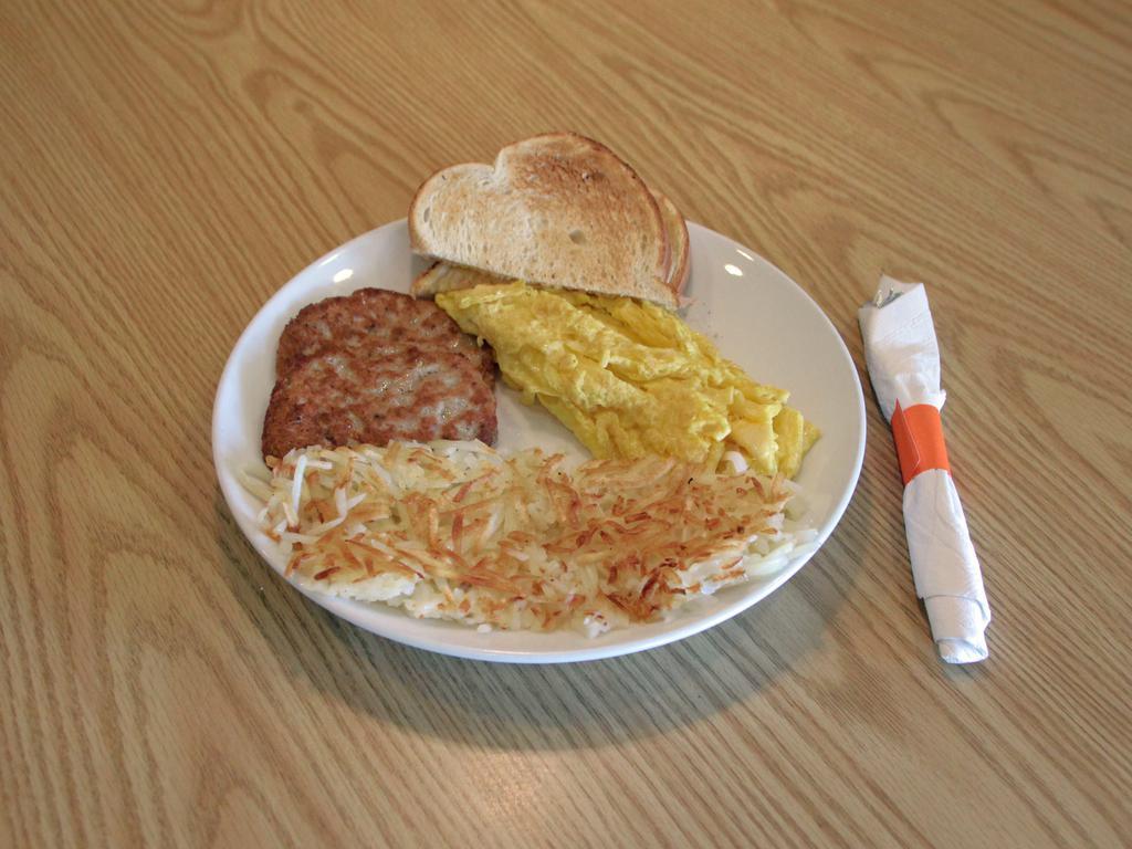 Big Bite Breakfast Combo · 2 eggs, choice of bacon, sausage or ham, choice of side and toast.