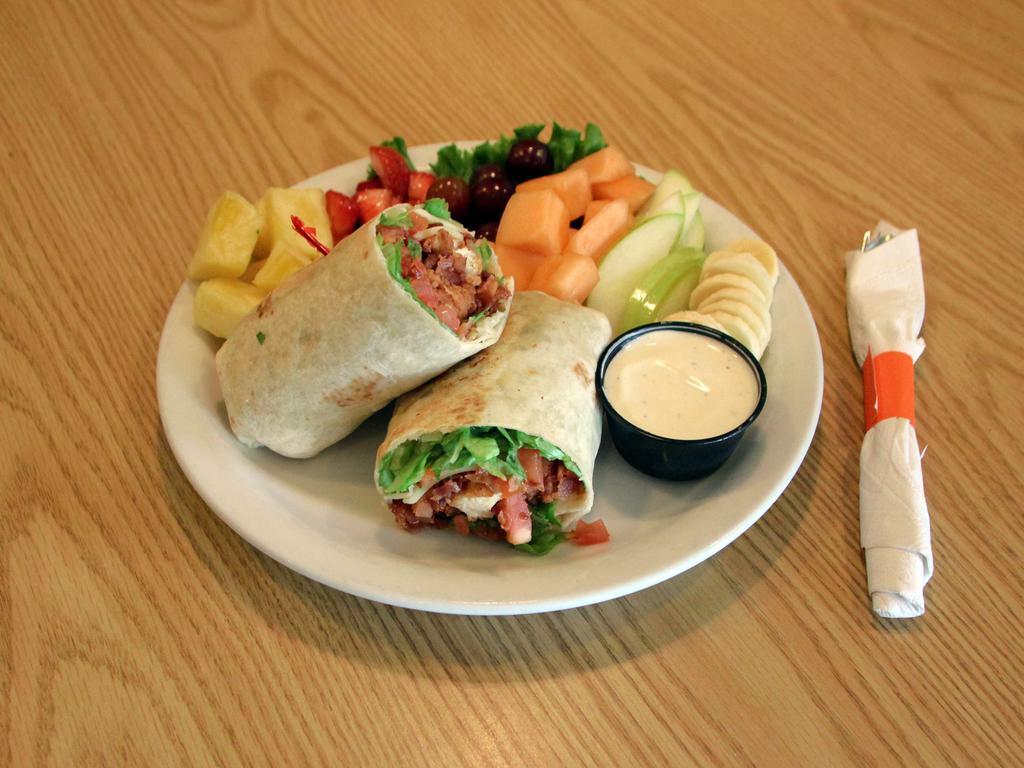 Monterey Ranch Chicken Wrap Specialty · Crispy or grilled chicken breast, Monterey Jack cheese, bacon, lettuce, tomato and a side of house ranch.