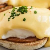 Queens Benedict · 2 poached medium eggs, 2 pieces of Applewood-smoked bacon, on a toasted English muffin toppe...