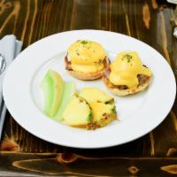 Duchess Benedict · 2 poached medium eggs, a grilled banger on a toasted English muffin, topped with regular hol...