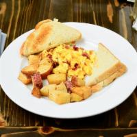Queen Croquet Scramble · 3 scrambled eggs with Diced applewood bacon, sharp cheddar cheese and mozzarella cheese. Com...