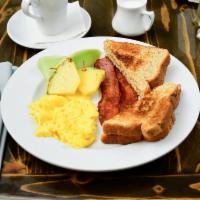 Eggs & Toast · Two eggs of your choice (more can be added) and your choice of toast. You can add on potatoe...