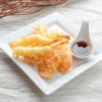 Tempura Prawn · 3 pieces. Deep-fried battered prawn with crispy sweet potato served with tempura sauce.