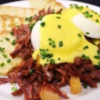CC's Scratch Corned Beef Hash and Farm Poached Eggs · Hollandaise sauce, country Italian toast.