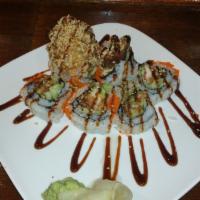 SR11. Spider Special Roll · Deep fried soft shell, crab, avocado, cucumber, top masago and eel sauce.