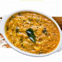 Dal Tadka  - Served with Basmati Rice · Yellow lentils sauteed with onions, tomatoes and spices.  - Served with Basmati Rice